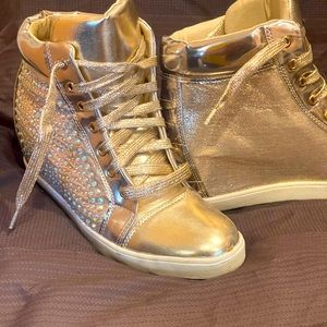Gold, wedge sneakers BLING stones Outer part of sneaker! Gold laced strings!Sz9